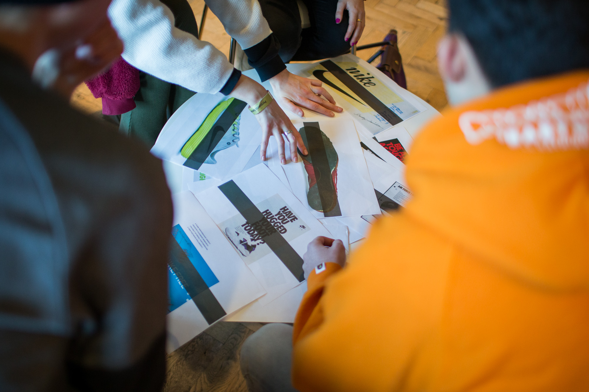 Students gathered around work on a table