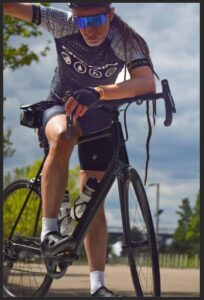 Paul training for ride London posing on his bike 